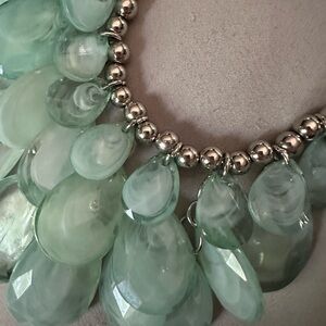 Necklace with aquamarine hanging teardrops